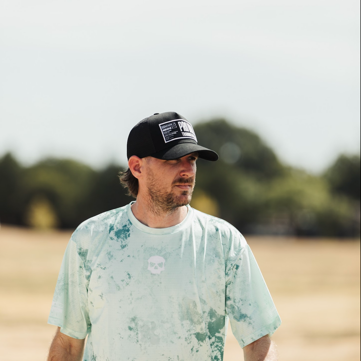 INFAMOUS™ Snapback Trucker Hat - Training Division - Black